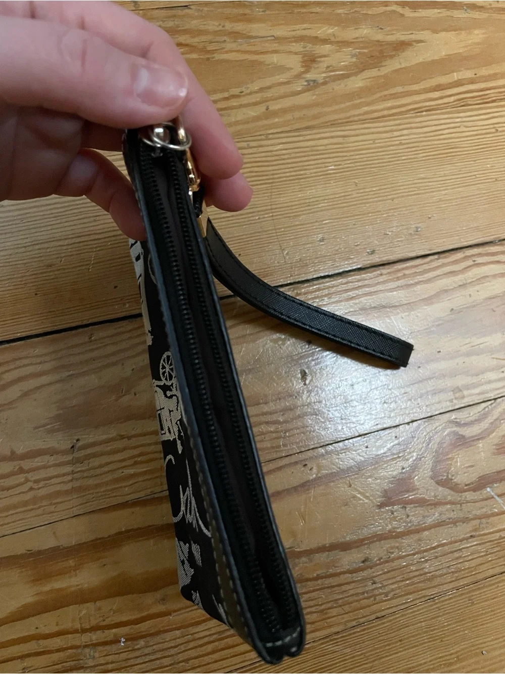 Coach Black Wristlet with Silver Carriage Print